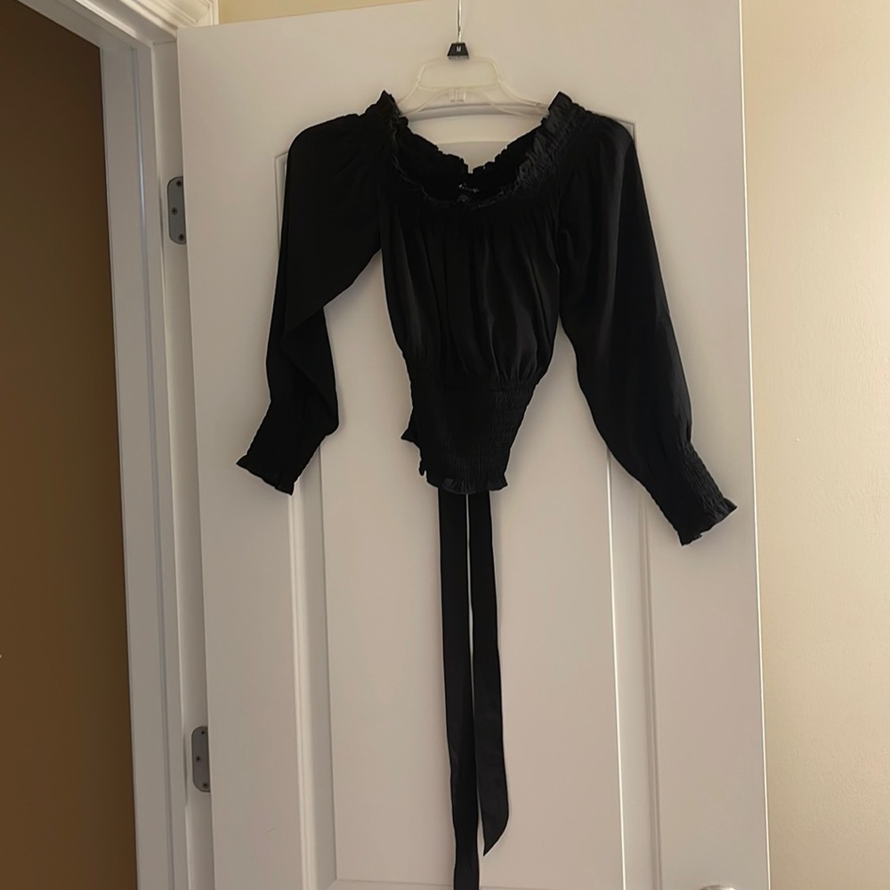 Black off the shoulder top.